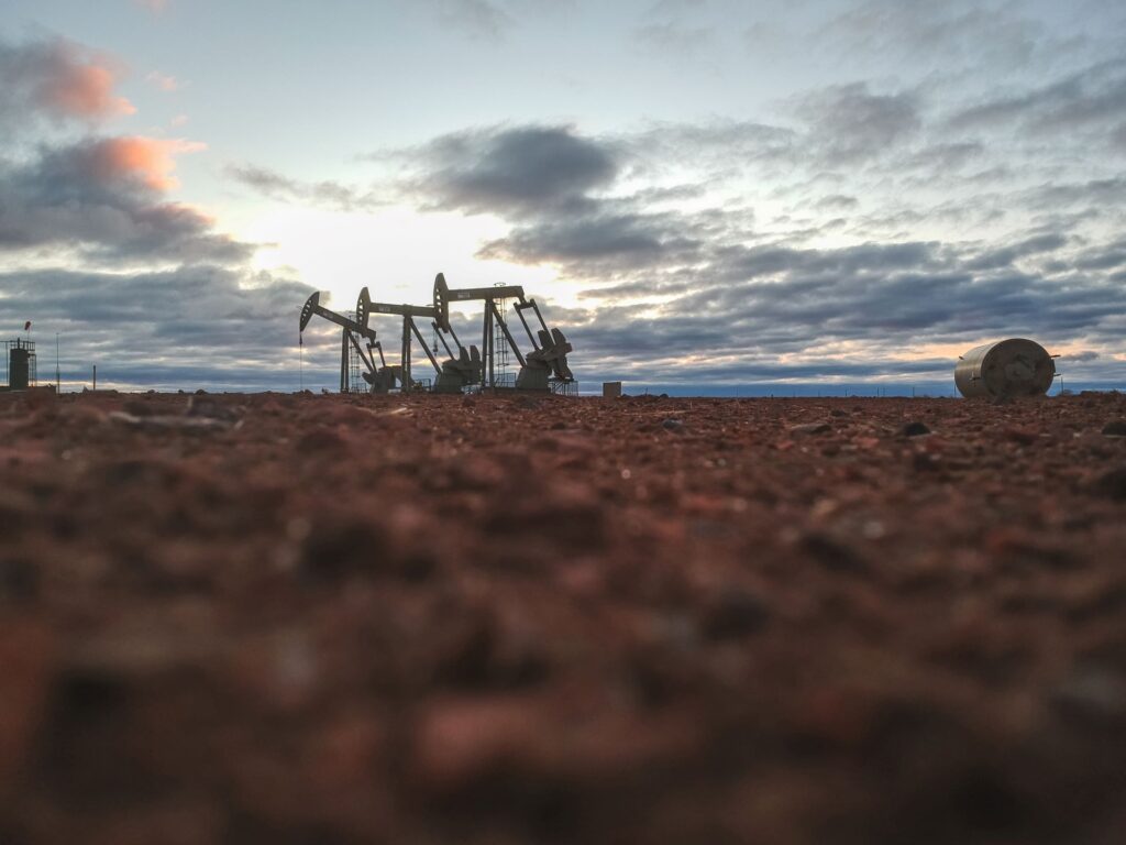 multiple oil rigs on the horizon