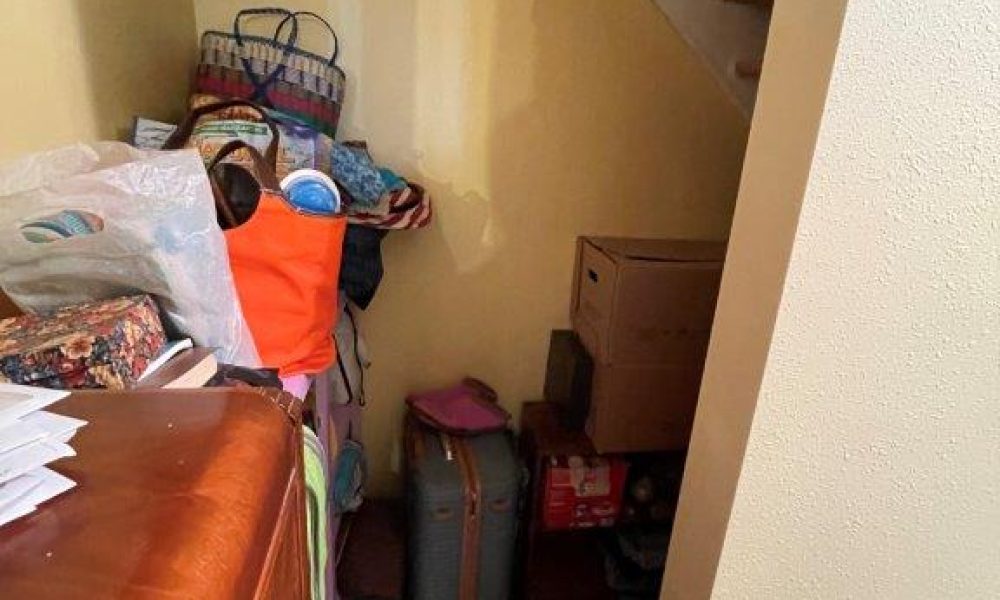 basement under stairs storage